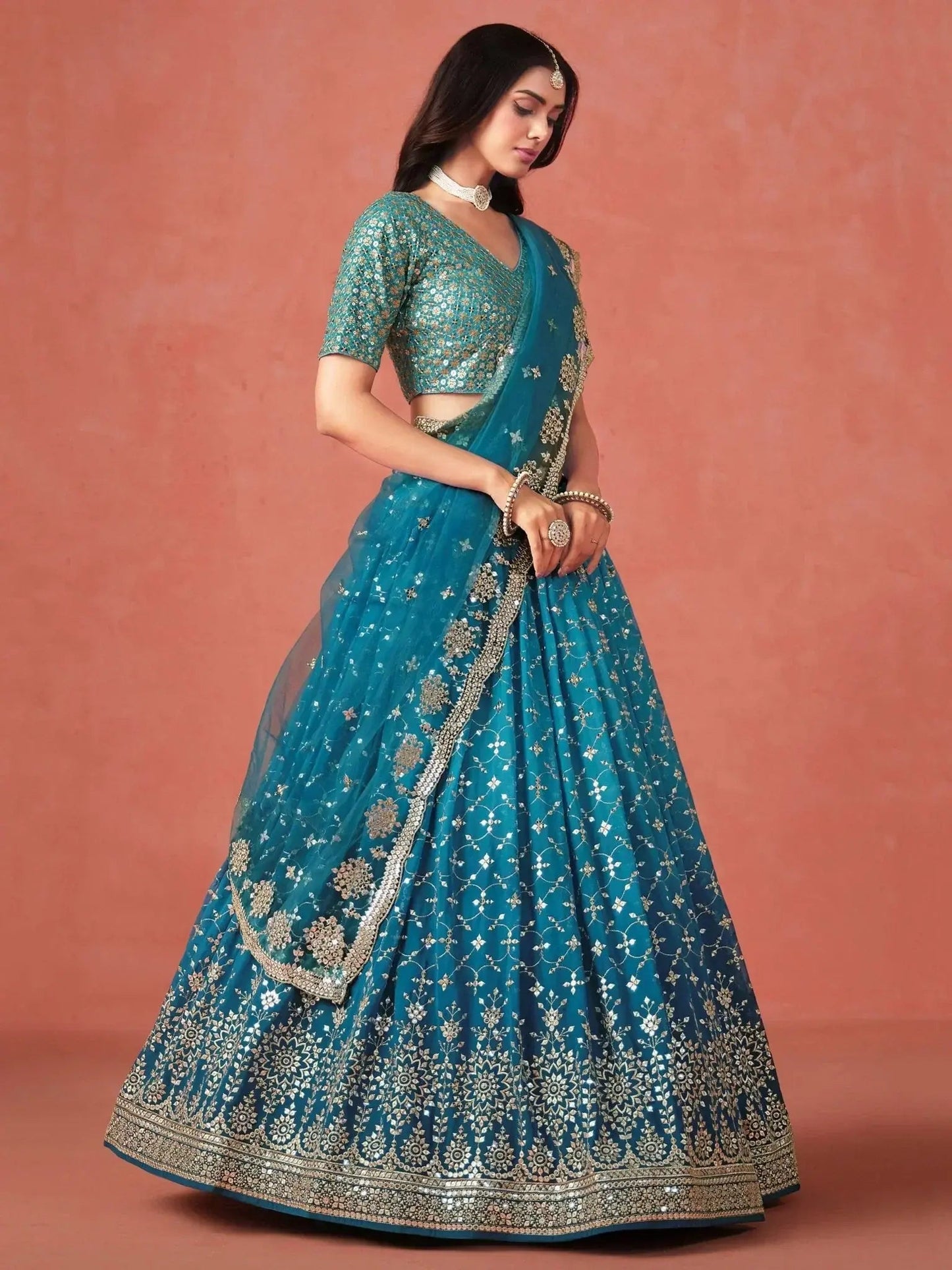 Adorable Teal Blue Georgette Zari Embroidered Lehenga Choli
