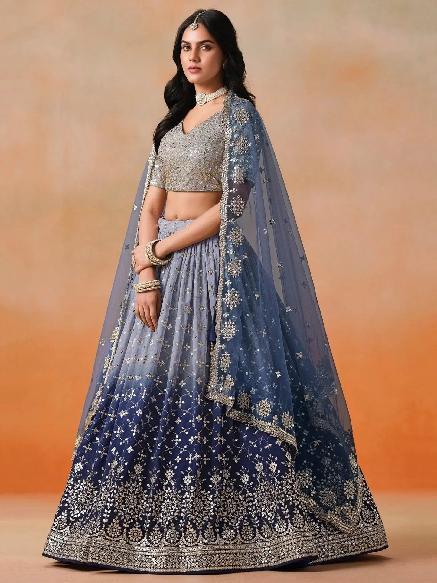 Attractive Navy Blue Embroidered Reception Wear Lehenga Choli