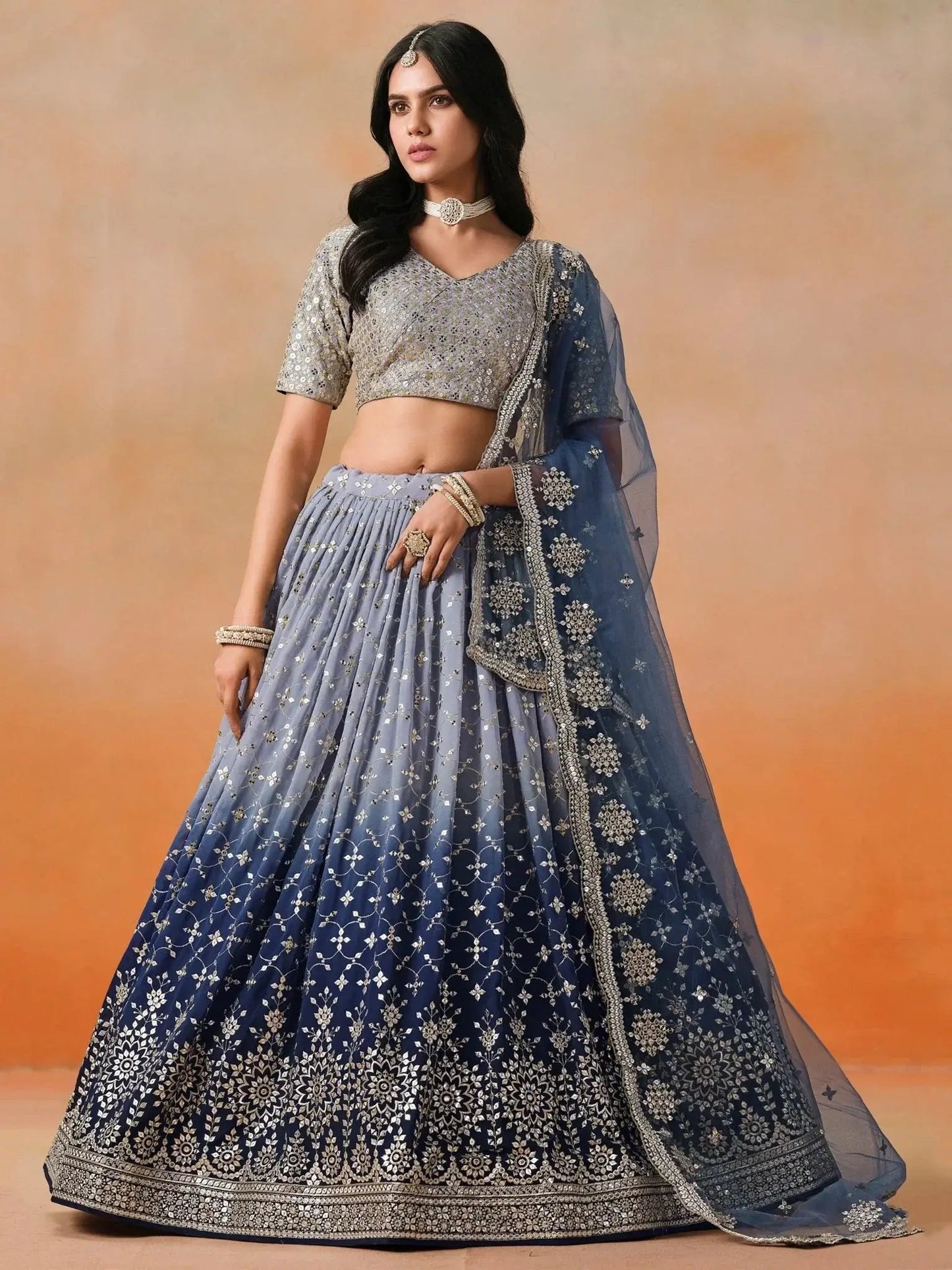 Attractive Navy Blue Embroidered Reception Wear Lehenga Choli