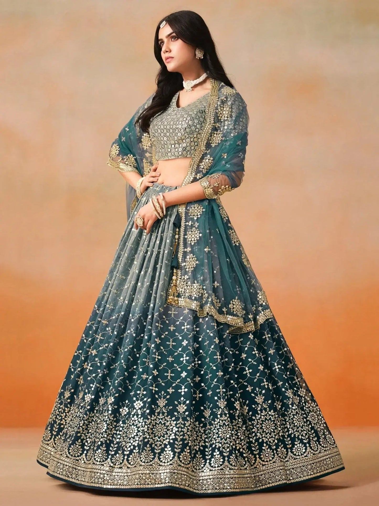 Glamorous Dove Blue Sequins Embroidered Georgette Lehenga Choli