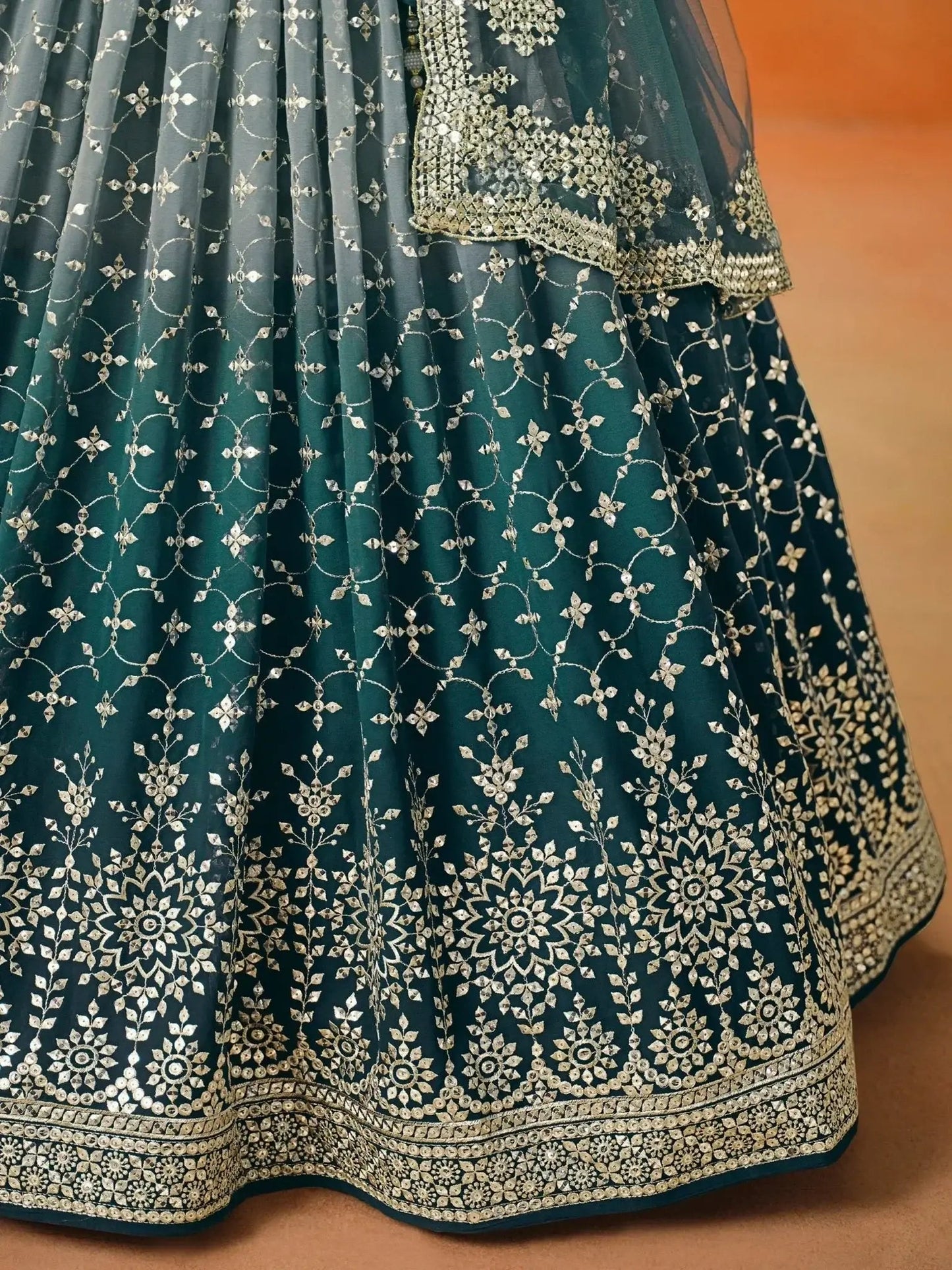 Glamorous Dove Blue Sequins Embroidered Georgette Lehenga Choli