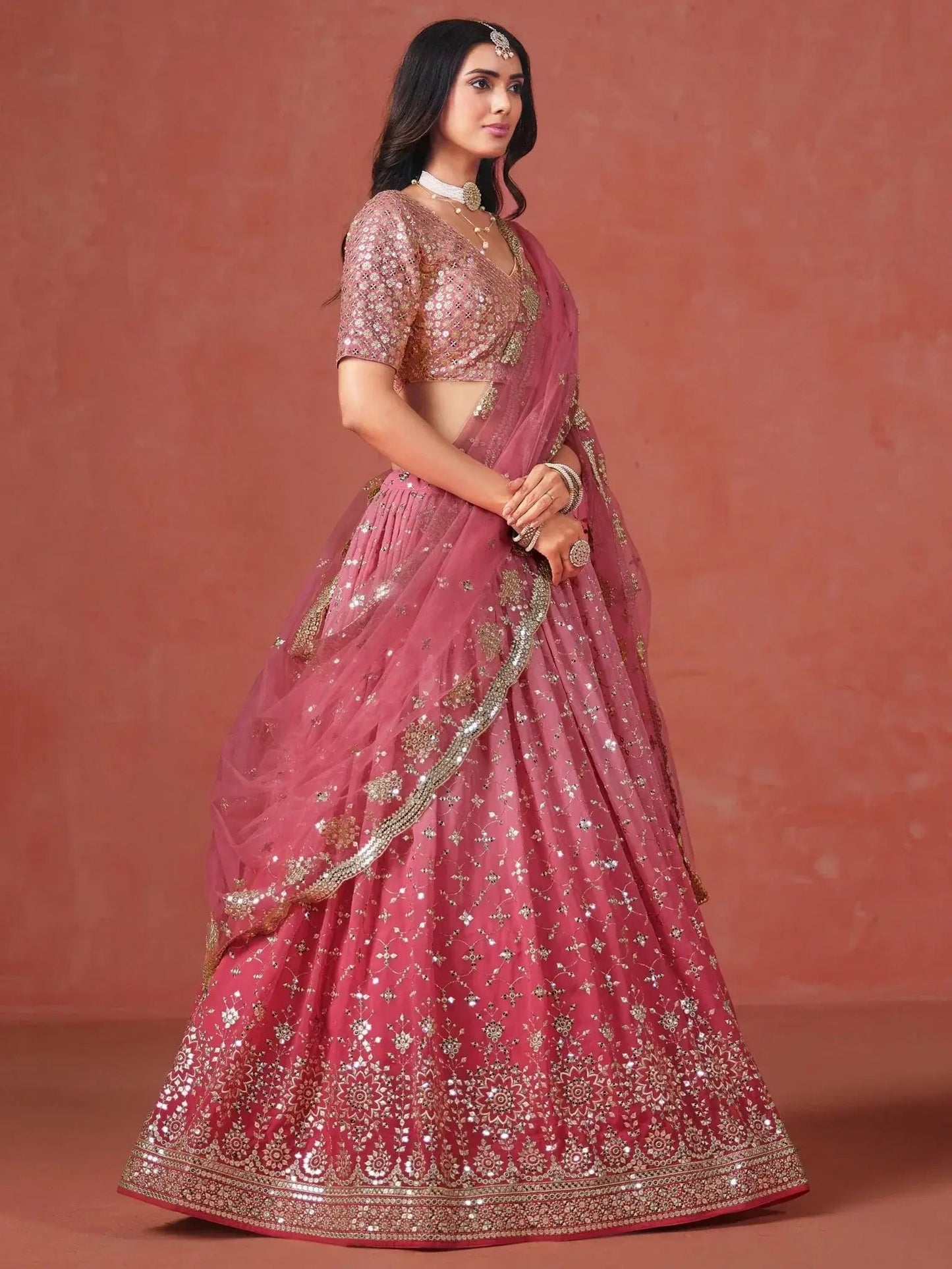Stunning Peach Georgette Sequins Lehenga Choli