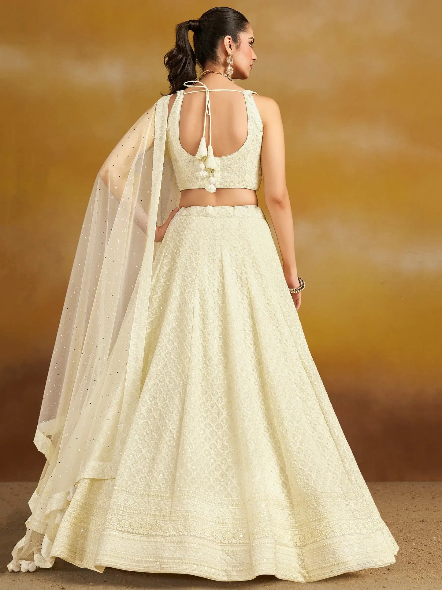Enchanting Off-White Thread Work Georgette Traditional Lehenga Choli