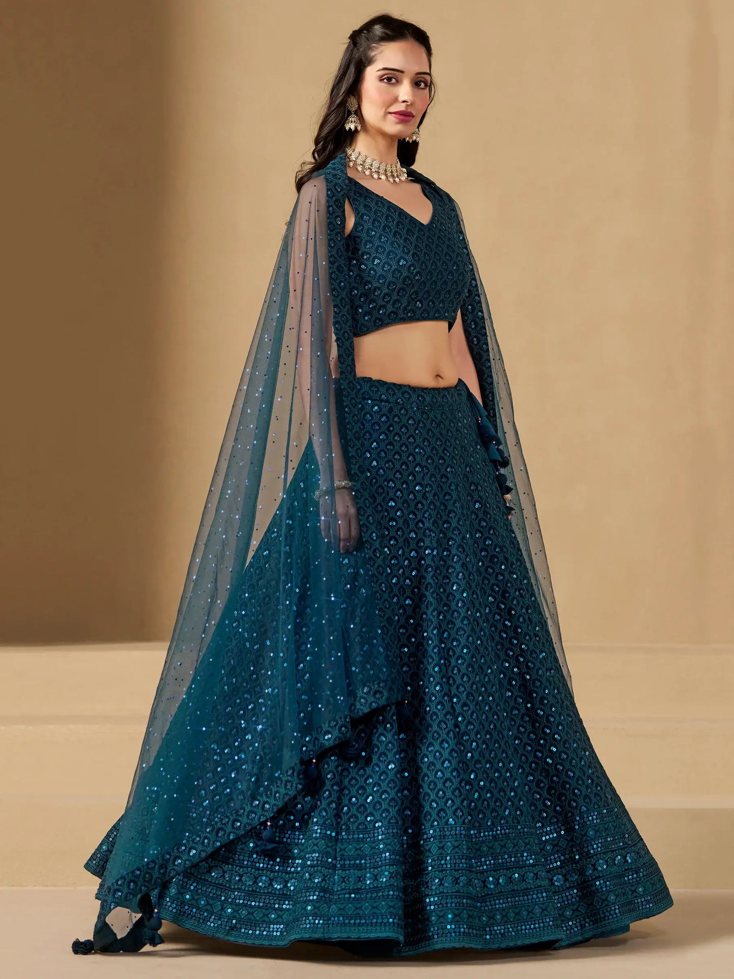 Fabulous Teal Blue Thread Embroidered Georgette Lehenga Choli