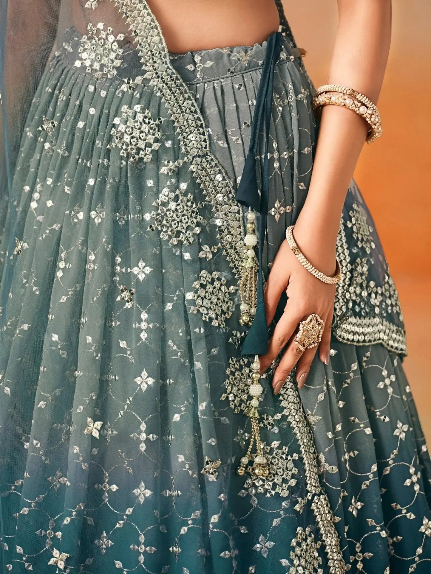 Glamorous Dove Blue Sequins Embroidered Georgette Lehenga Choli