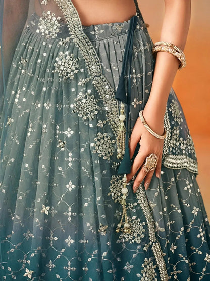 Glamorous Dove Blue Sequins Embroidered Georgette Lehenga Choli