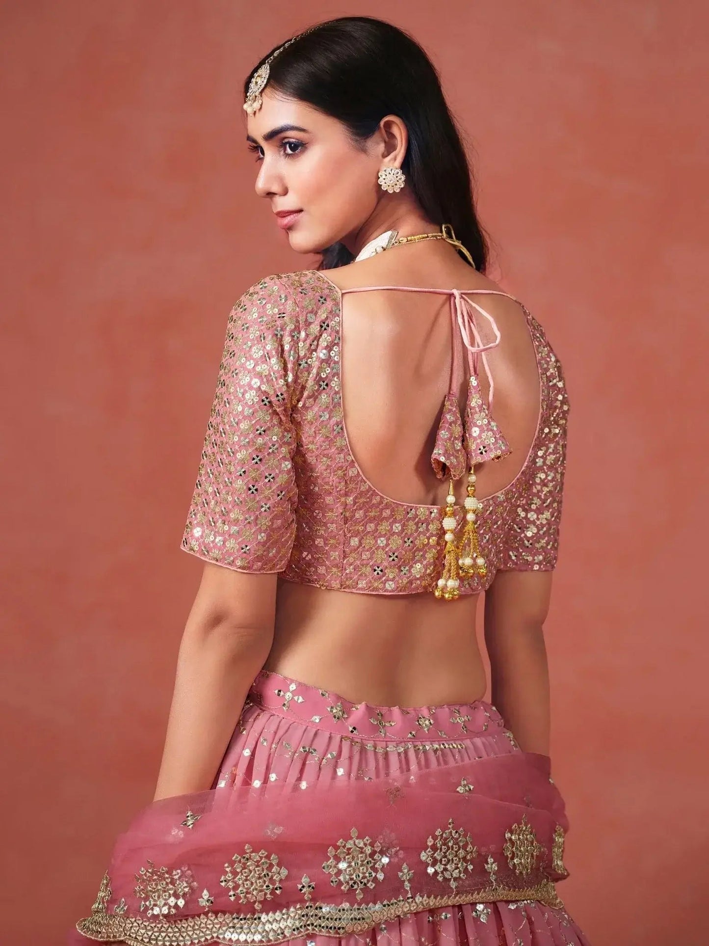 Stunning Peach Georgette Sequins Lehenga Choli
