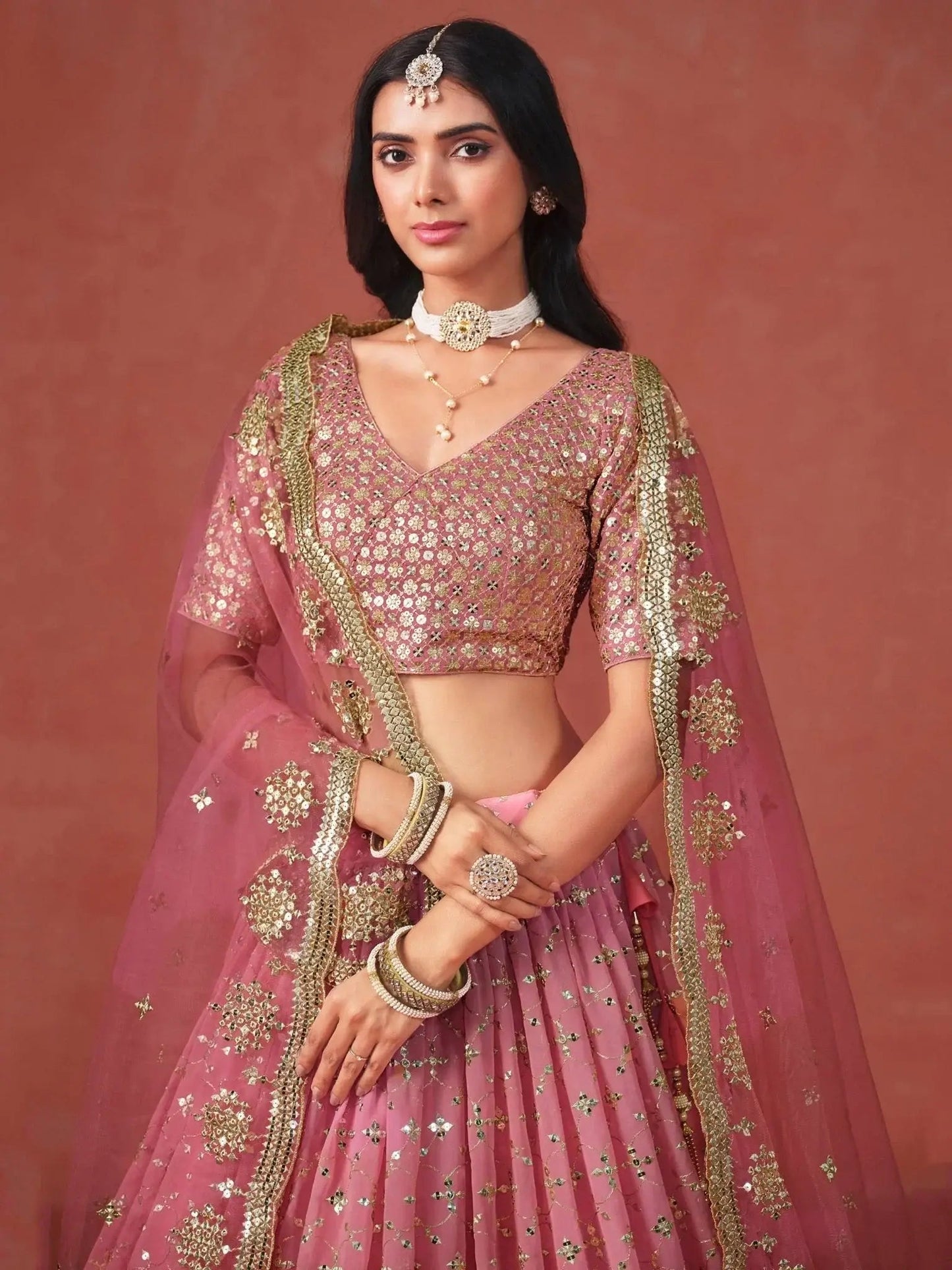 Stunning Peach Georgette Sequins Lehenga Choli