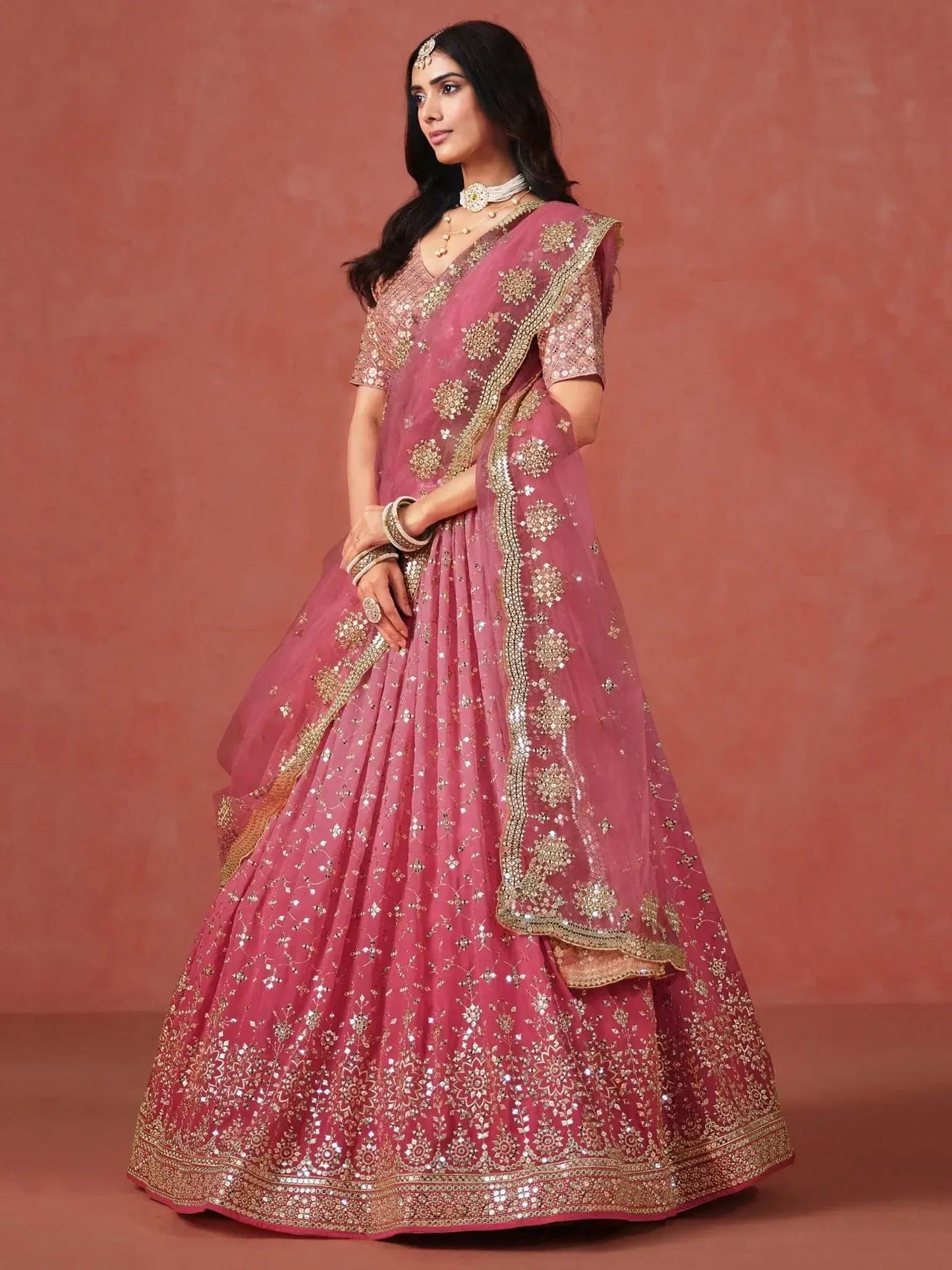Stunning Peach Georgette Sequins Lehenga Choli